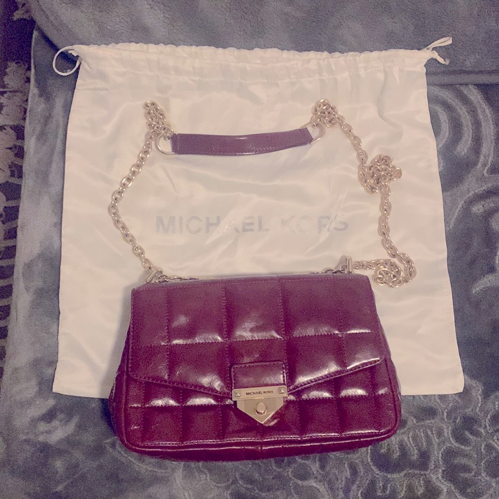 Michael Kors red quilted leather purse with beautiful gold chain shoulder strap